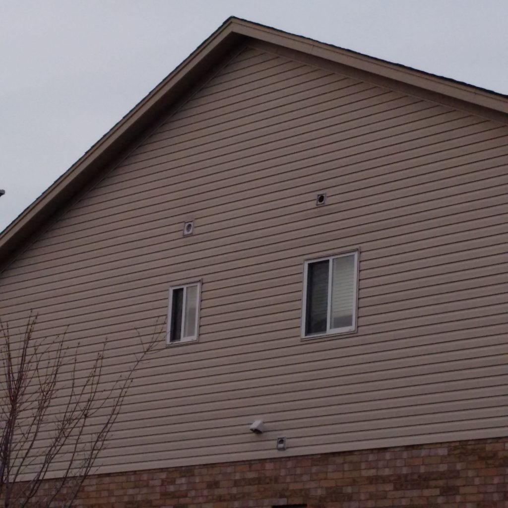 Example of side of house with missing vent flaps